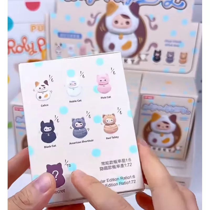 Conjunto completo de peluche de vinilo de la serie PUCKY Roly Poly Kitty abierto