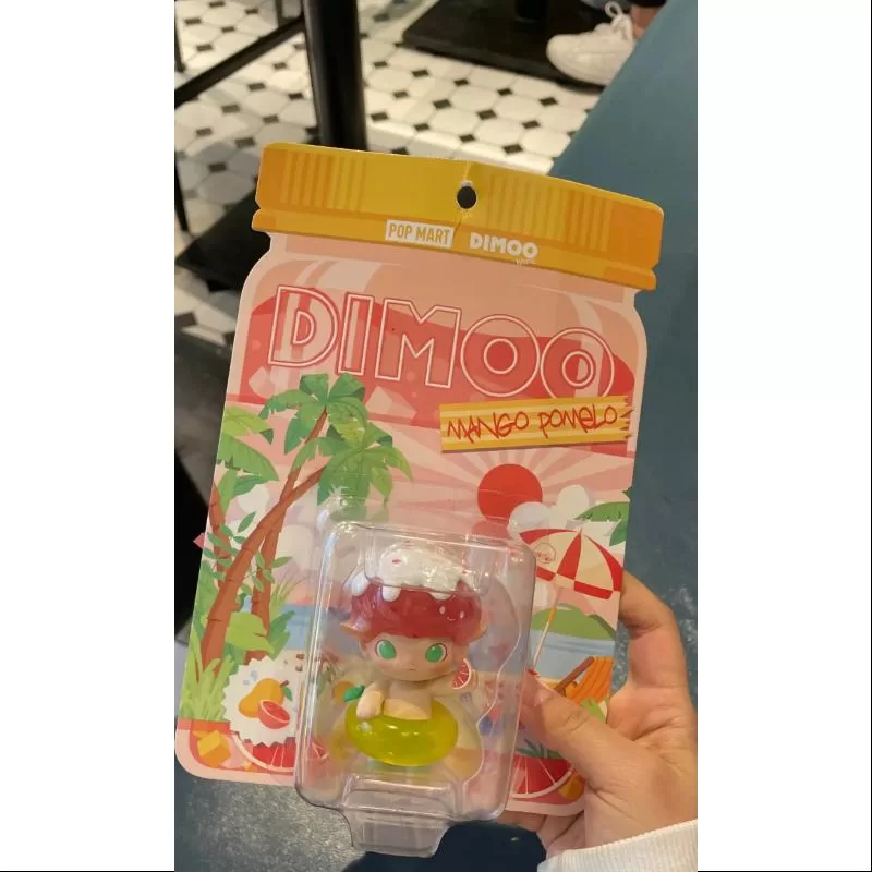 Figura DIMOO Mango Pomelo Edición limitada