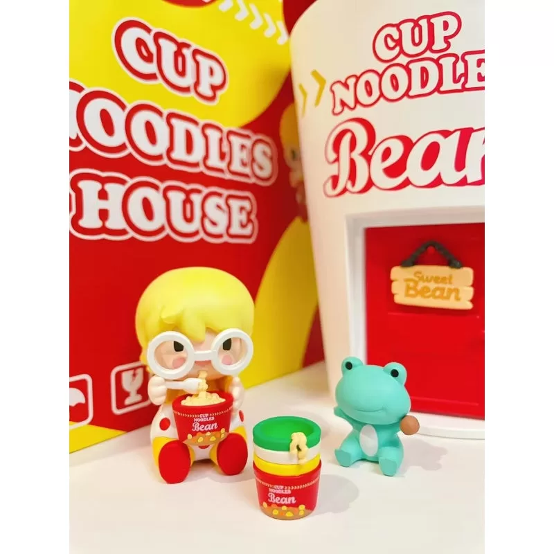 Figura de casa de fideos instantáneos con frijoles dulces