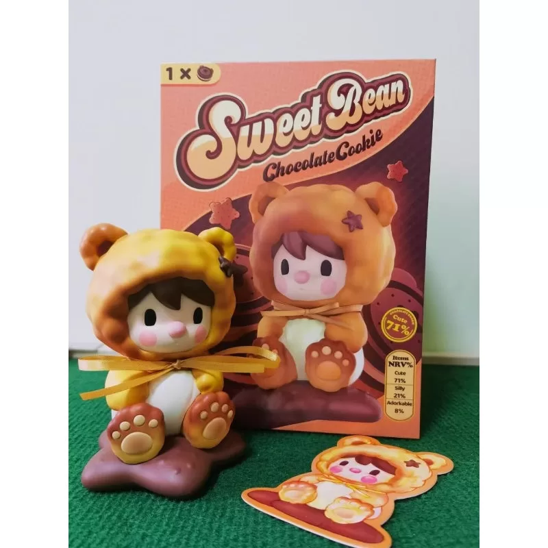 Figura de galleta de chocolate con frijoles dulces