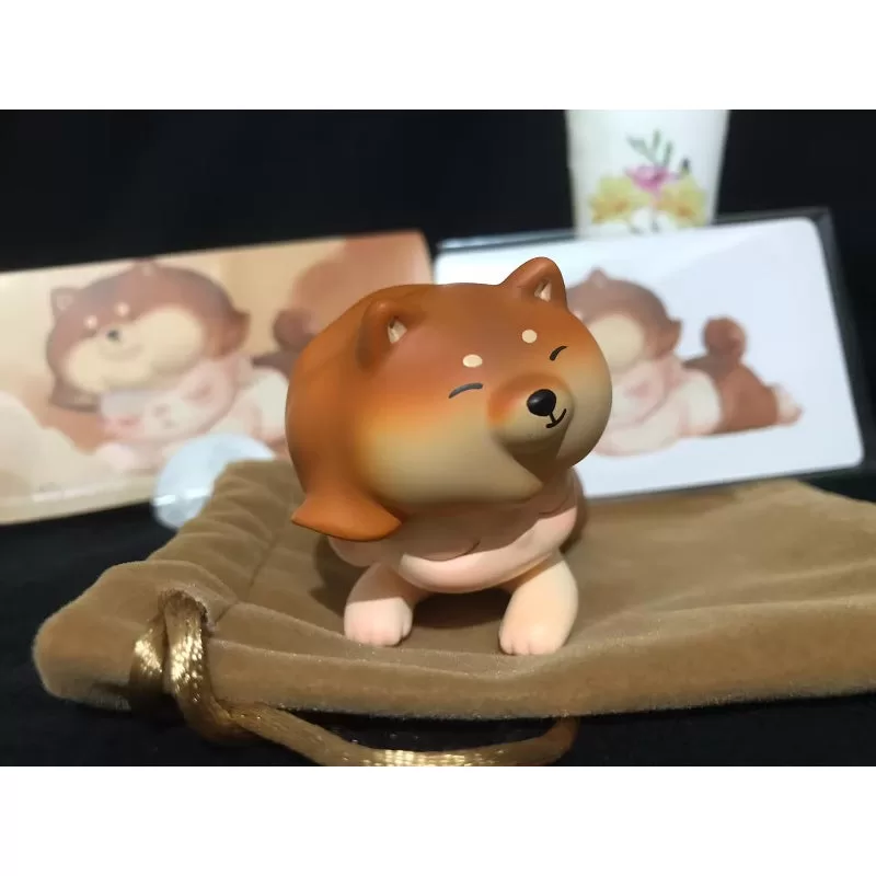 Figura limitada DIMOO Lay Down Shiba Inu