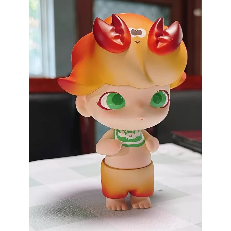 Figura limitada de cangrejo bebé DIMOO