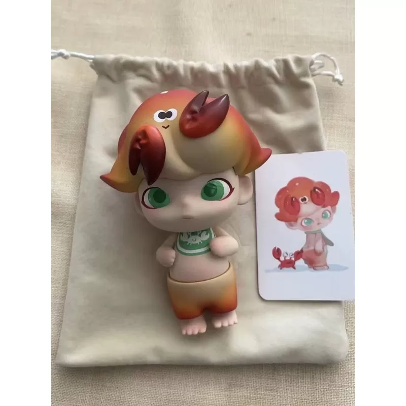 Figura limitada de cangrejo bebé DIMOO