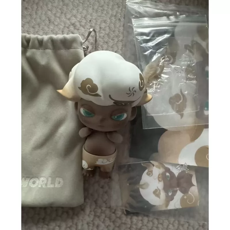 Figura limitada de la vaca dorada de DIMOO