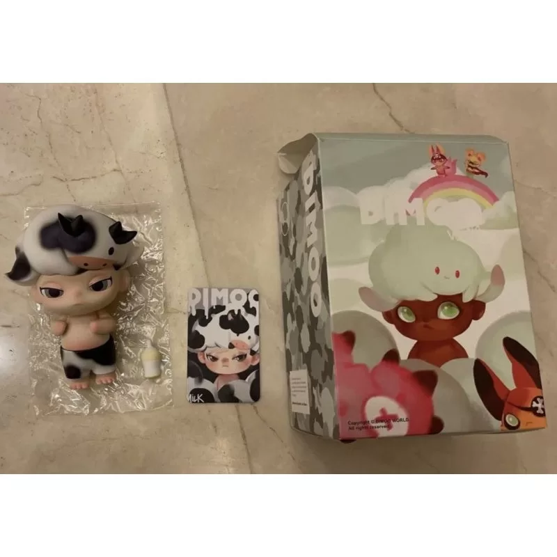 Figura limitada de vaca lechera DIMOO