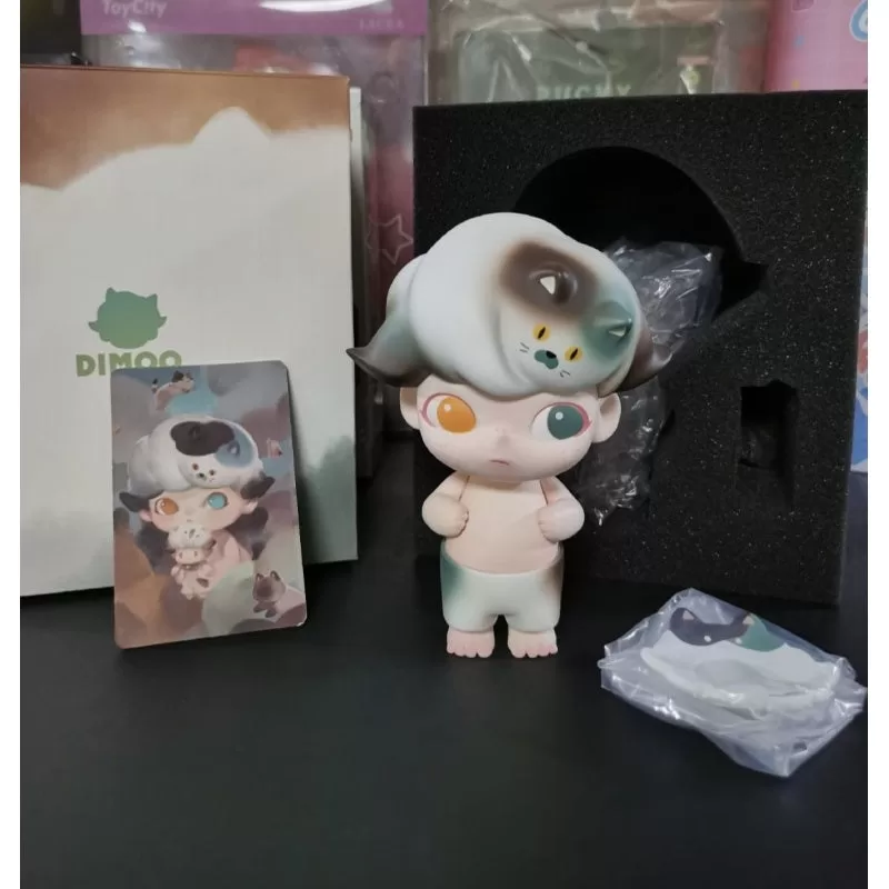 Figura limitada del gato calicó azul de DIMOO