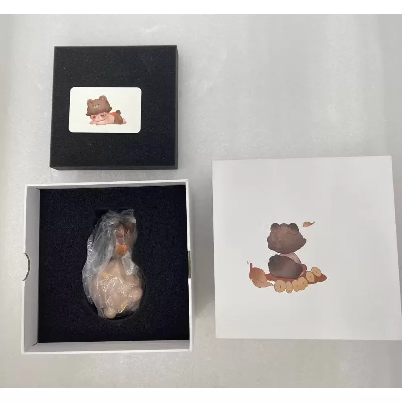 Figura limitada del oso Lay Dowm de DIMOO