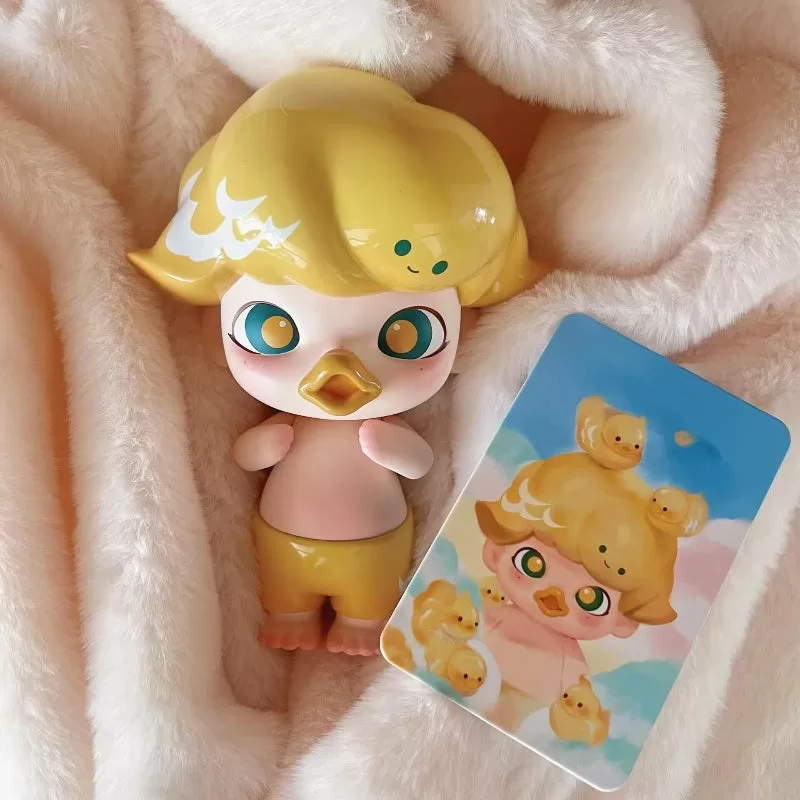 Figura limitada del patito amarillo DIMOO