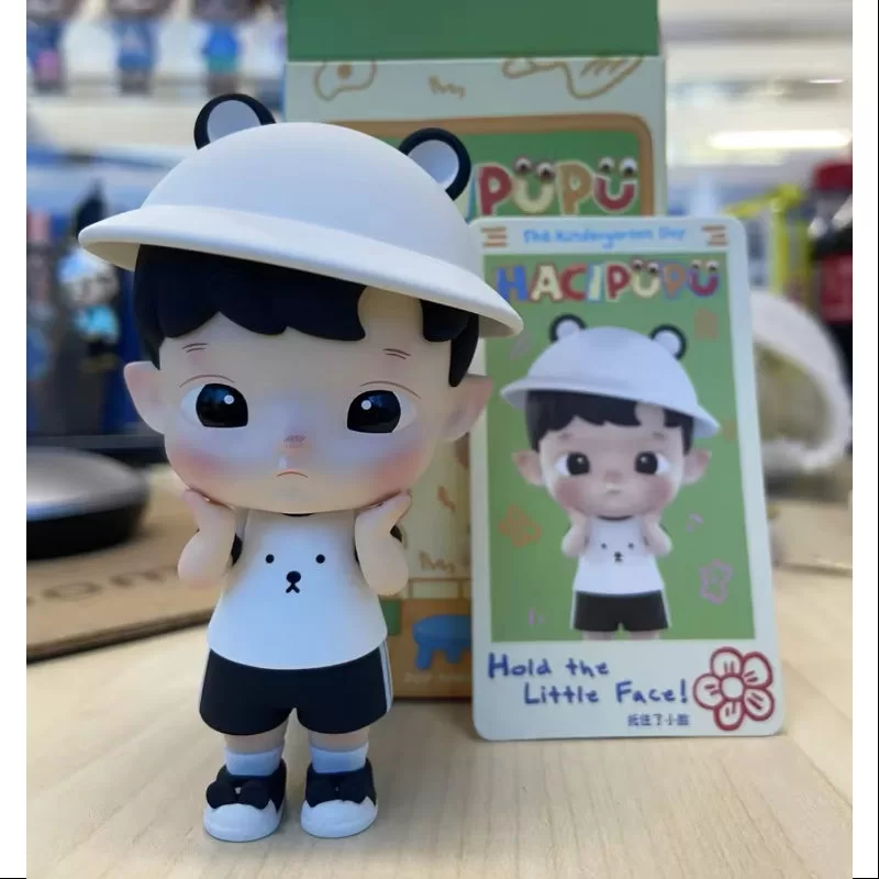 Hacipupu La serie del día del jardín de infancia Sostén la carita