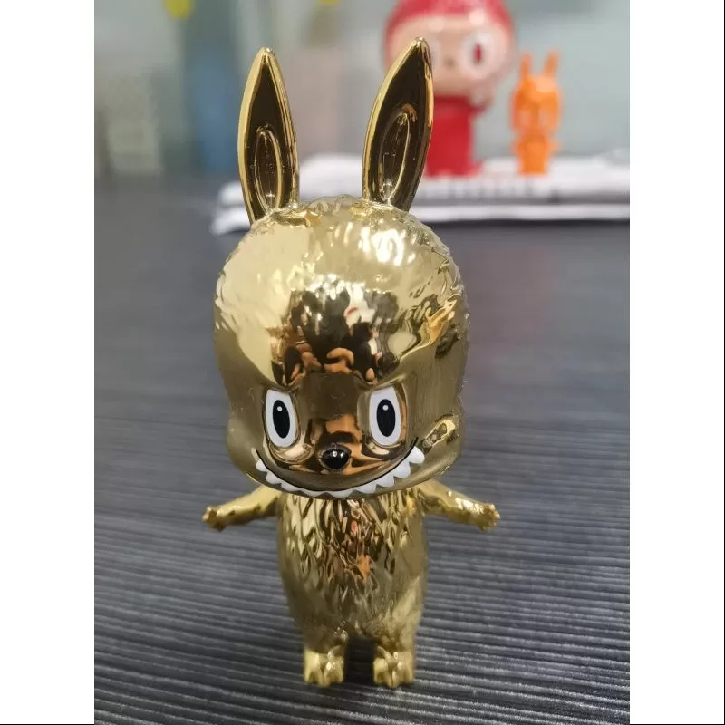 Labubu The Monsters Mini Labubu Goud HOW2WORK 20º Aniversario LIMITADO