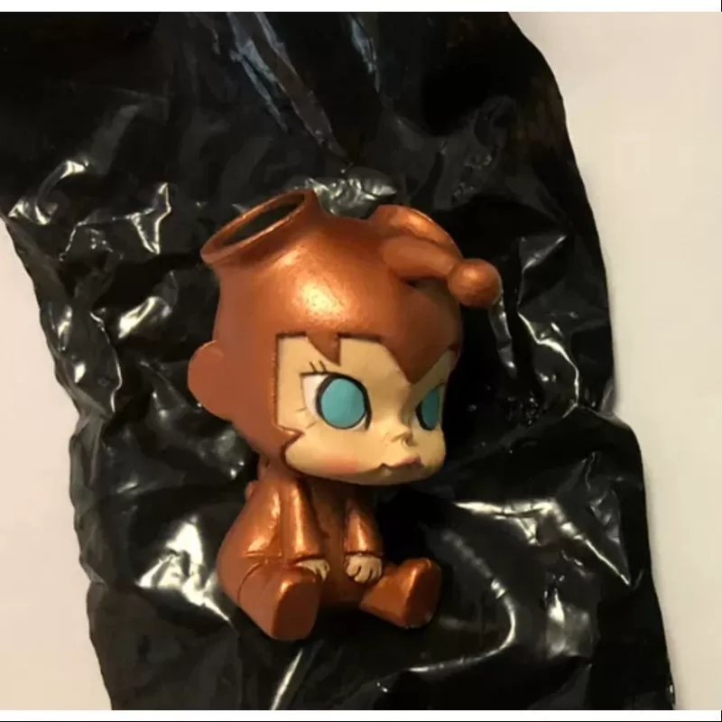 MOLLY Bebé Molly Serie 1 Pequeño Pez Niño Dorado