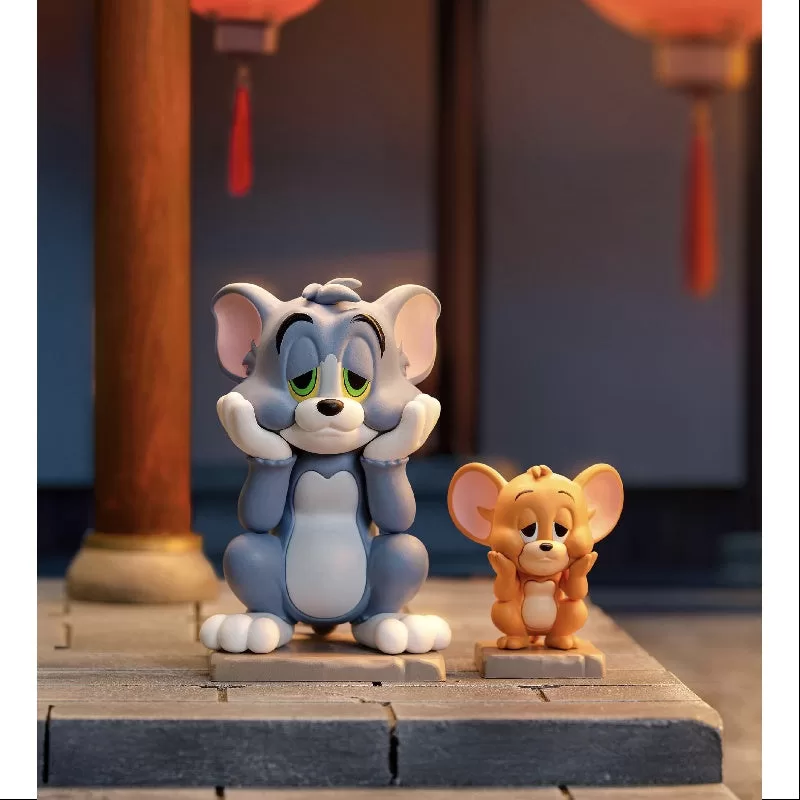 Momento emotivo de la serie Brújula Prohibida de Tom y Jerry en Pop Mart