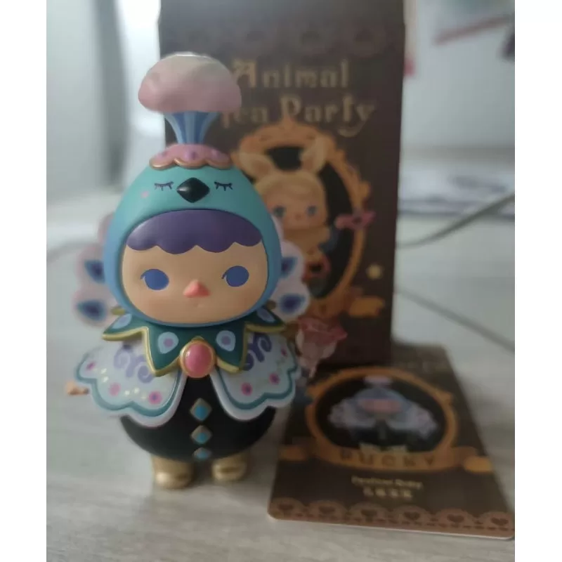 Serie Fiesta del Té Animal PUCKY Bebé Pavo Real