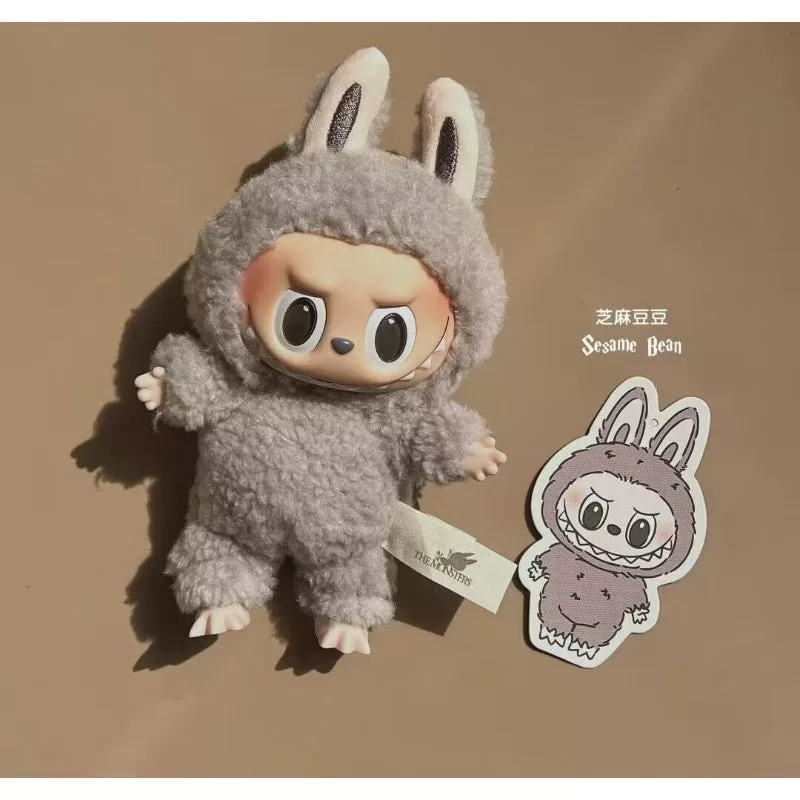 Serie de caras de vinilo de macarrones emocionantes de Labubu The Monsters con frijoles de sésamo