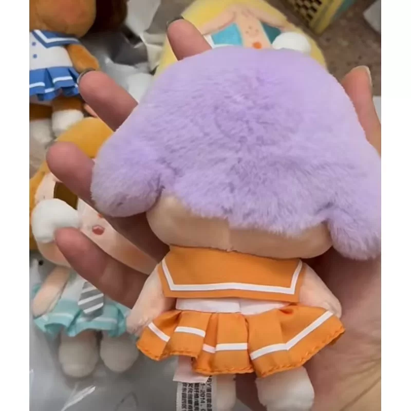 Serie de colgantes de peluche Crybaby Sunset Concert de color naranja brillante Serie de colgantes de peluche Crybaby Sunset Concert de color naranja brillante