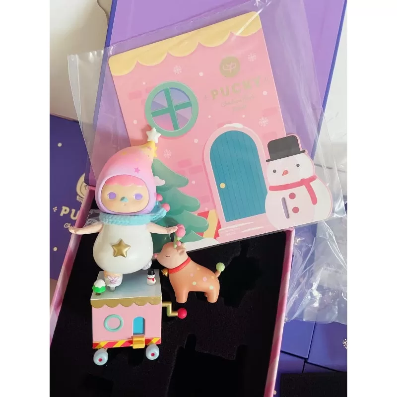 Serie de desfiles musicales navideños de PUCKY Bebé patinador sobre hielo secreto